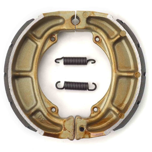 Brake shoes with springs grooved